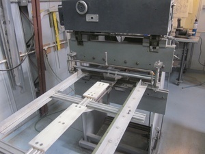 A vertical press brake set up for corrugated aluminum skin fabrication